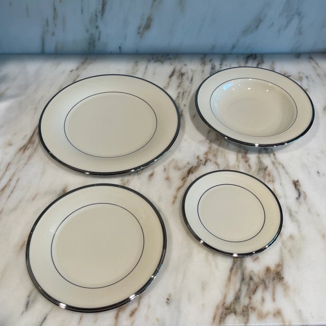 Lenox Solitaire Ivory and Platinum China. 4 Piece dinner service including 10.75” Dinner Plate, 8.25” Salad or dessert...