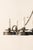 A French mid 20th century suspended eight-light forged-iron chandelier. This vintage French chandelier features a central...