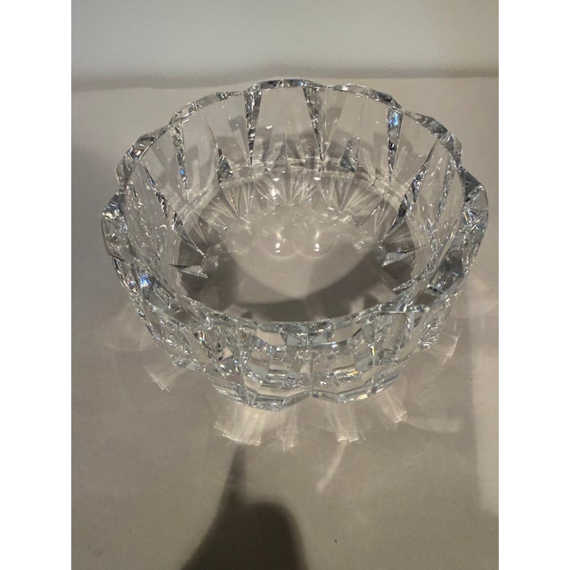 Beautiful Orrefors bowl to use or admire. Diameter is 6" across. Depth is about 2.5" and height is 3". Base is 4.5" across.