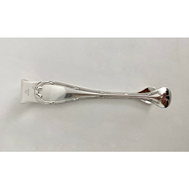 Antique Christofle silverplate pair of sugar tongs made in France. with maker's mark and hallmarks on side. Detailed...