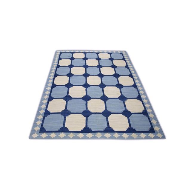 This exquisite Turkish flatweave kilim rug is a stunning masterpiece of traditional craftsmanship. Each rug is...