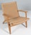 Hans J. Wegner CH-25 lounge chair, 1950 Produced by Carl Hansen & Son, Copenhagen, Denmark. Oiled, patinated oak frame...