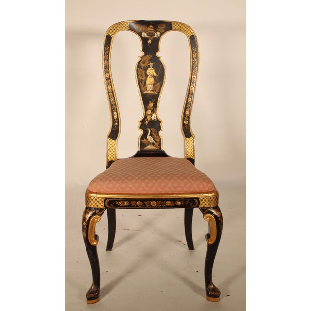 Queen Anne style black chinoiserie decorated side chair, circa 1950. Crest rail with central pagoda decoration, flanked by...