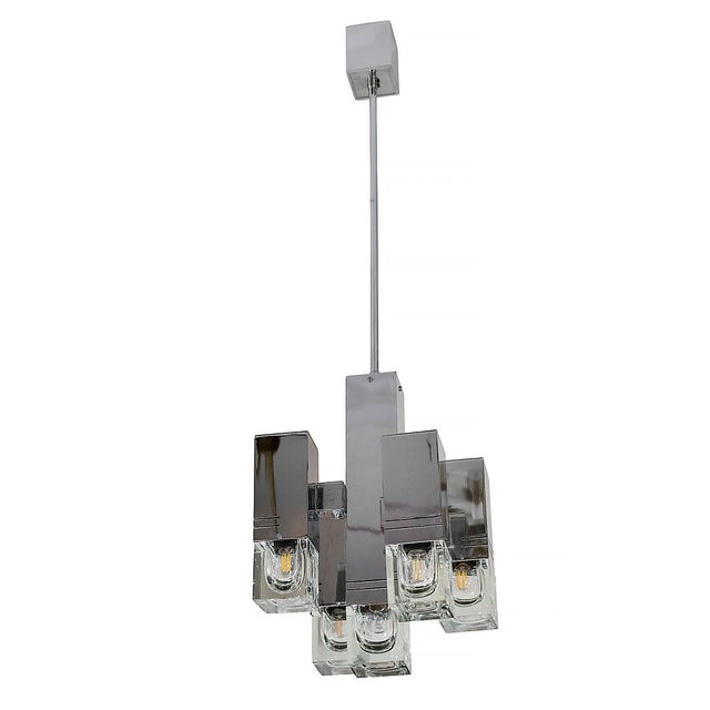 Italian mid-century chandelier by sciolari from 1970s. the chandelier is made in chrome with thick and heavy glass shades...