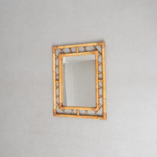French Bamboo Mirror – Circa 1970 This charming bamboo mirror, crafted around 1970, is a handmade piece that reflects the...