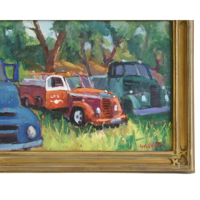 Antique trucks landscape oil painting on artist board by listed artist Silvio Silvestri (1948-2018.) Silvestri was a...