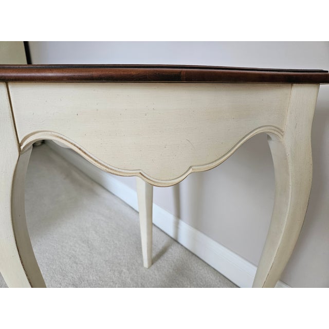 This lovely triangle table is a wonderful accent to any room. It's a great place for a small lamp, a beautiful plant, or a...