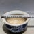 Classic Chinese blue and white porcelain bowl decorated with hand-painted phoenix birds woven among dense grape...