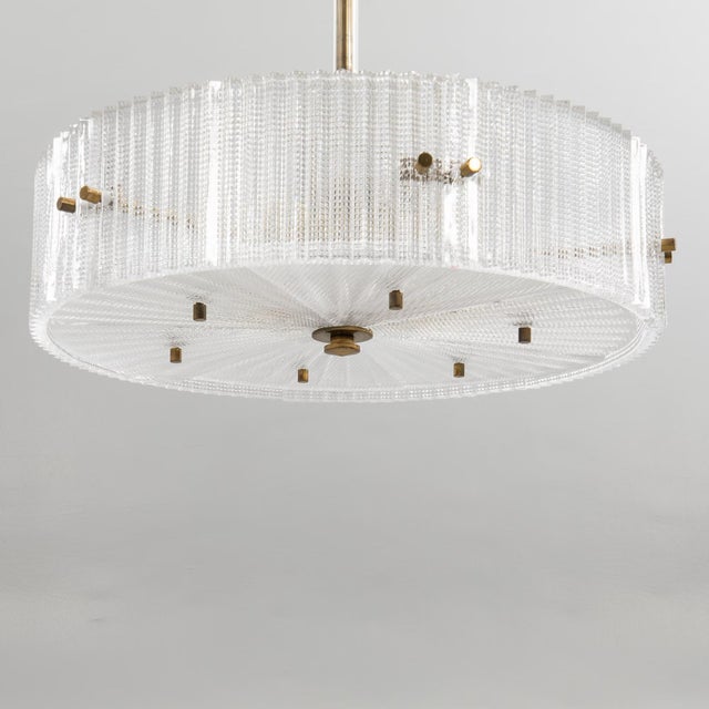 Swedish Orrefors Large ceiling lamp from the 1960s by Carl Fagerlund for Orrefors. Brass frame with six glass side panels...