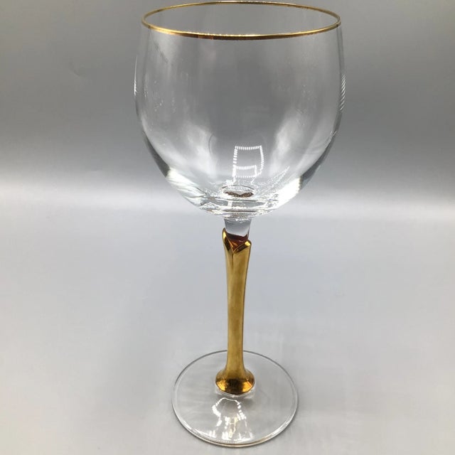 Versailles gold floral stem crystal wine glasses with clear bowl and gold rim made by Colony.