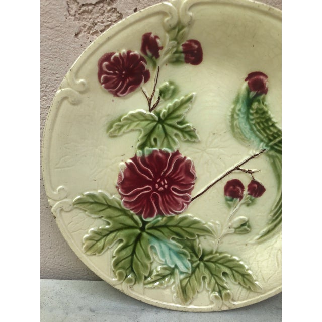 French Majolica paradise bird and pink flowers signed Salins, circa 1890.