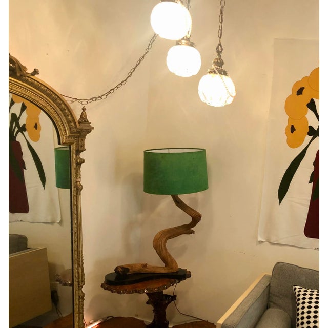 Similar to The Les Paul Living Room Lamp, which sold for close to $9000, and truly a very sexy lamp. The Wabi-Sabi is real...