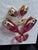 This rare and exquisite 12-piece antique stemware set features hand-blown Bohemian ruby red glass adorned with hand-...