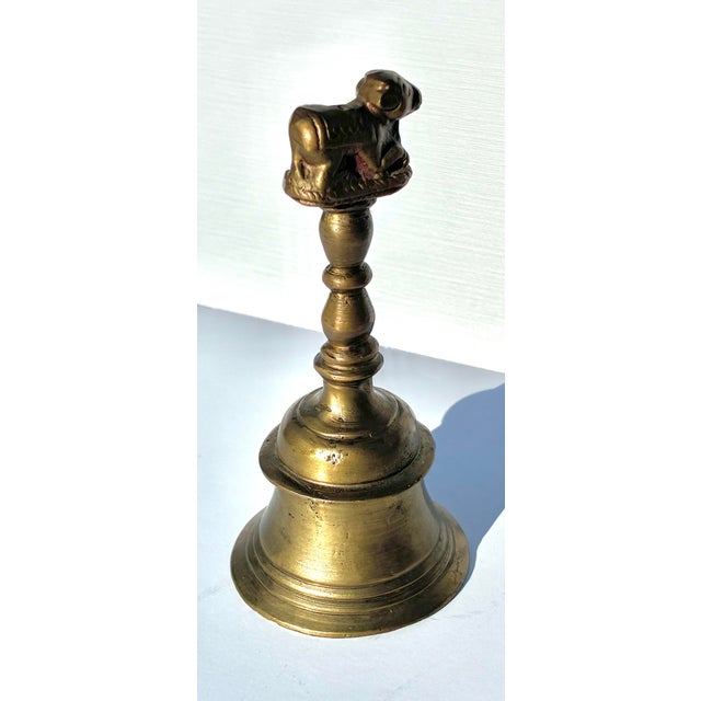 This Antique Nandi puja bell, also know as a shanti, is a traditional Indian ritual item used in Hindu ceremonies like...
