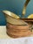 This beautifully aged vintage brass and copper handled basket is a striking example of functional antique design....