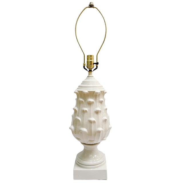 A striking pair of Palm Beach Regency style Italian table lamps crafted from high-quality porcelain and featuring a...