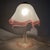 A true work of glass art that captivates at first glance. This extremely rare and precious Murano glass table lamp is a...