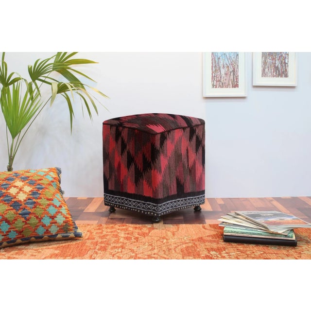 Chic handmade ottoman crafted using wood and upholstered using hand-woven kilim wool rug is a multi-purpose fashion pouf...