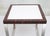 Stylish designer side table. Three equal sides of 64cm, like a cube. High-quality workmanship. High-gloss chrome-plated...