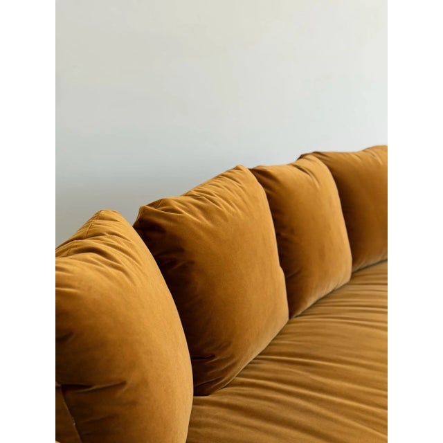 W87 D34 H32.25 SW75.5 SD20.5 SH19 A beautifully restored vintage sofa by Howard Furniture featuring a sculptural solid oak...