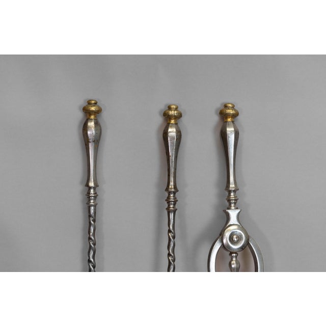 Set of steel fire irons. Circa 1860.