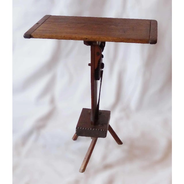 Early 20th century, primitive rustic style side table. Hand made with various components, the table is well worn with a...