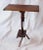 Early 20th century, primitive rustic style side table. Hand made with various components, the table is well worn with a...