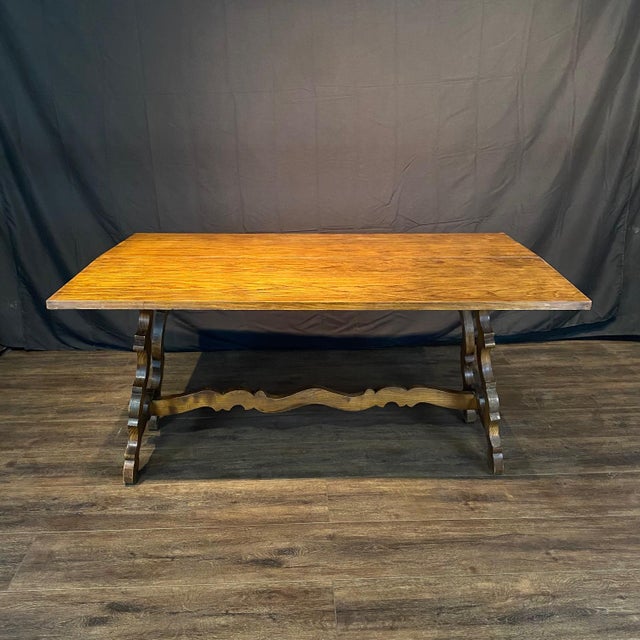 Elegant French console table or dining table with a beautifully proportioned wood top that opens to create a generous...