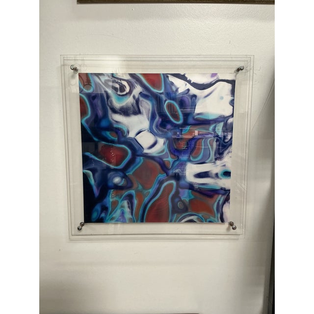 A vibrant archival print by Christopher Martin, this piece captures the artist’s bold color palette and playful,...