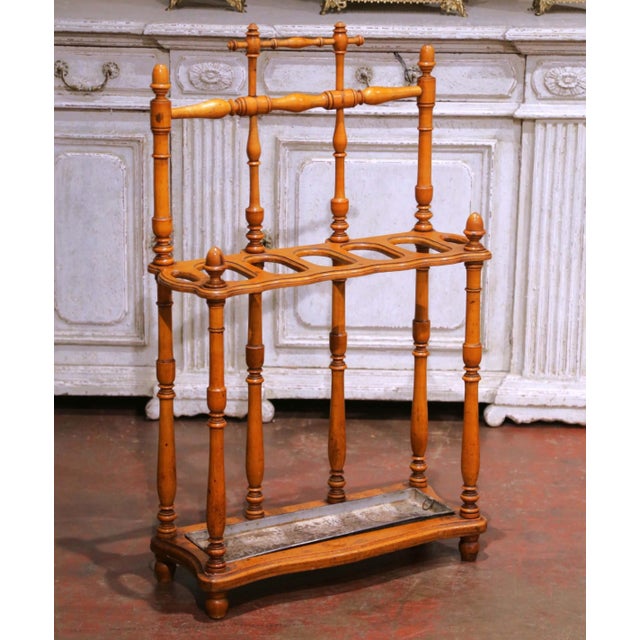 Crafted in France circa 1880, this elegant antique umbrella and cane stand reflects the refined taste of the Aesthetic...