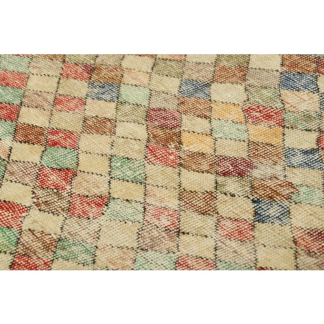 Made with hand-knotted wool in Turkey circa 1960-1970, this 3x6 vintage runner rug is an exciting new addition to Rug &...