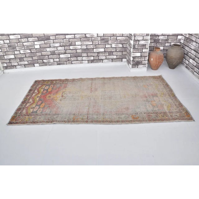 Textile Vintage Distressed Turkish Area Rug, Faded Traditional Motif in Muted Earth Tones For Sale - Image 7 of 9
