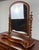A striking late 19th century mahogany tilting shaving / vanity mirror with barley twist uprights and contoured mahogany base.