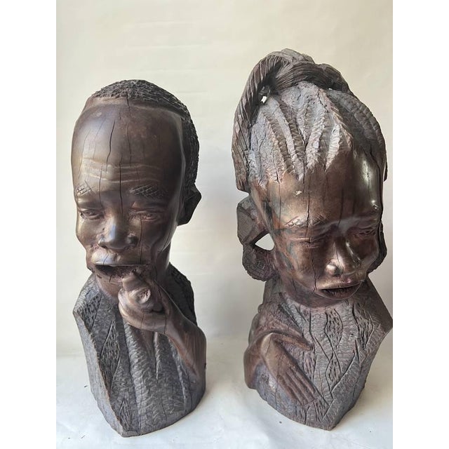 Pair of Vintage African Carved Ebony Wood Busts ( Man and Woman). Vintage African Carved Ebony Wood Male and Female Bust...