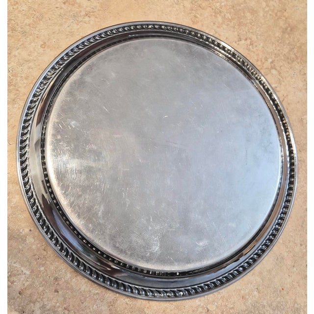 Classic vintage Wm. Rogers silverplate serving tray with an elegant traditional design and substantial decorative...