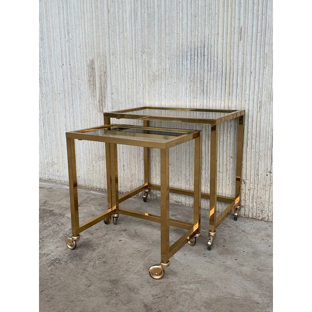 Mid-Century Modern Nesting Tables Italian Design 1970 in Brass With Smoked Glass and Wheels - a Pair For Sale - Image 3 of 11