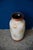 This large German vase from the 1960s has an elongated oval shape and a speckled, nuanced glaze. Placed on the floor or on...