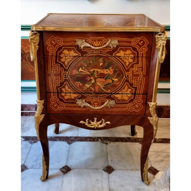 Add refined European character to your interior with this French Louis XV-inspired two-drawer commode, beautifully crafted...