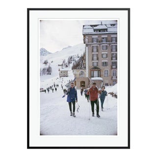 Skiers in St Moritz 1963 by Slim Aarons Black Framed C-Print For Sale