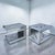 Stunning 1970s vintage Ello chrome and bronze side tables. These C-shape side tables are made in a city scape style with...