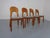 Set of four teak dining chairs from Niels Koefoed and produced by Hornslet Møbelfabrik in Denmark. New upholstery in gray...
