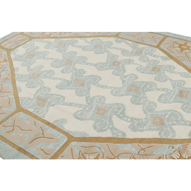 Hand-knotted in wool, this 8x10 rug by Rug & Kilim features geometric patterns in the style of a Leleu or Da Bruhns...