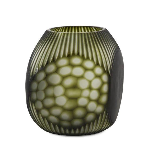 The Green Sculptural Small Vase This vase features a unique four-sided design with intricately cut multiple patterns....