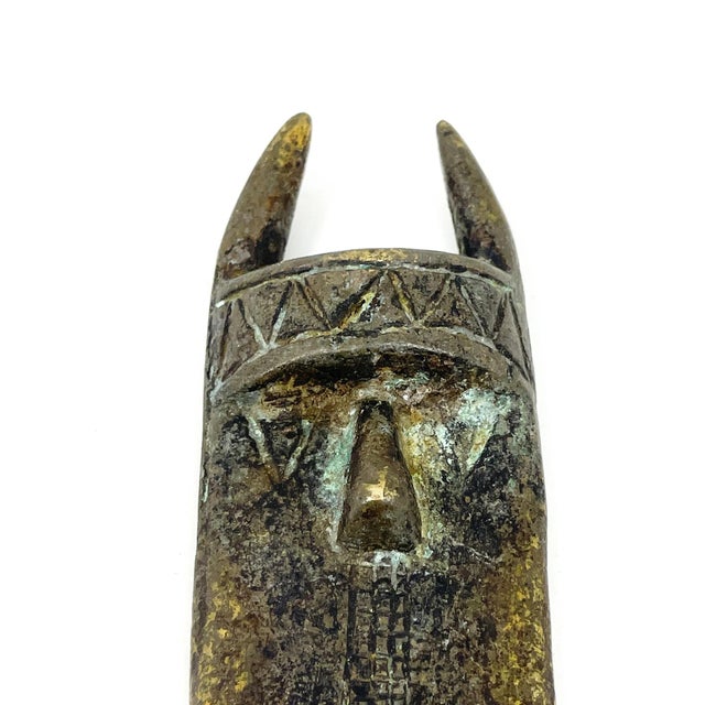 The Toma masks, exquisite and culturally significant, are striking embodiments of artistic prowess within the traditions...