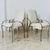 Set of 4 modern dining chairs, Italian manufacture from the 1970s. The frame is made of metal with a gold finish,...