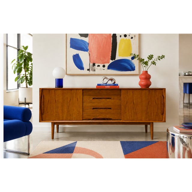 Impeccable Mid Century Modern styled Handmade Credenza featuring clean lines and gorgeous design detailing. This credenza...