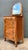 This exceptional early 20th-century chest is distinguished by its richly figured bird’s-eye burl veneer, displaying a...