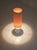 This is a mid-century white ceramic table or floor lamp with a spiral base and cylindrical shade, attributed to Tommaso...