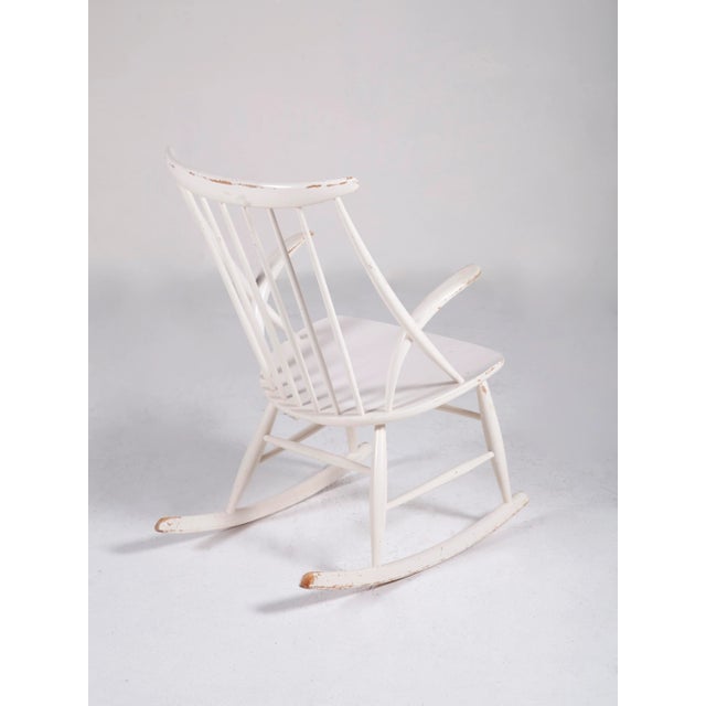 Model IW3 rocking chair designed in 1958 by Kristian Illum Wikkelsø and produced by Niels Eilersen. Good condition I have...