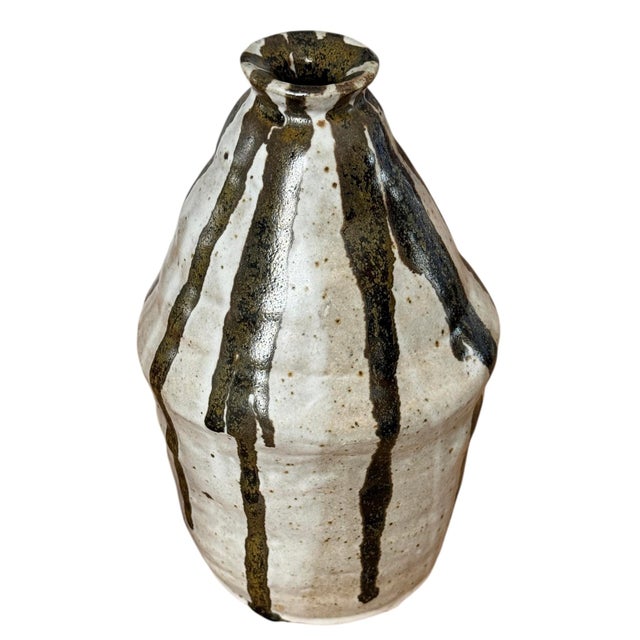 Beautiful studio pottery vase with drip glaze. This feels organic and is very well made. Can be used as a vase, jug,...